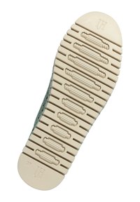 Sohle eines Schuhs mit einem strukturierten Design in hellem Beige, ausgeprägten Rillen und einer runden Zehenkappe, gekennzeichnet durch ein Logo in der Nähe der Ferse.