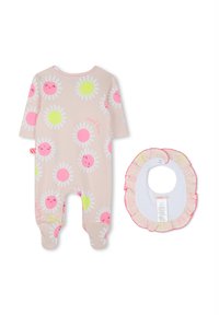 Body in cotone rosa chiaro con margherite bianche, faccine sorridenti e dettagli verdi; include un bavaglino coordinato con bordo arricciato.