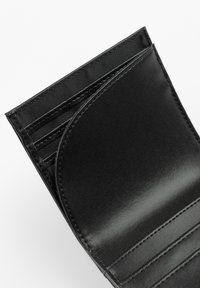 Black leather wallet featuring multiple card slots and a smooth texture. Interior showcases a sleek design with minimal stitching details.