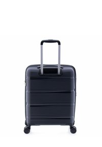 Valigia rigida da cabina nera con design cordonato, manico estensibile argentato, quattro ruote piroettanti e chiusura con zip.
