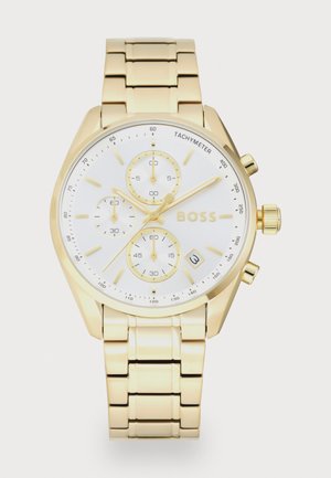 Relógio de aço inoxidável dourado com mostrador branco, submostradores de cronógrafo e exibição da data. Apresenta uma bracelete de elos suavemente curvados e escala de taquímetro.