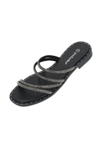 Sorte flade sandaler med flere perlebesatte stropper, en tekstureret sål og naglede detaljer langs kanten. Glat fodseng for komfort.
