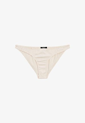 Beige Bikinis für Damen aus glattem Stoff mit einem kleinen schwarzen Markenetikett in der Mitte des Taillenbunds.