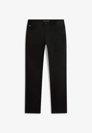 Mustad sirge lõikega teksad, millel on nööpidega lukk, esimesed taskud ja vööriidel triikunööpidega brändisilt.