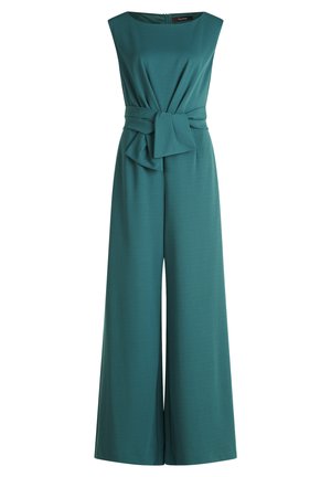 Teal jumpsuit with a fitted bodice, wide legs, and a knotted waist detail. Made from soft, stretchy fabric with a boat neckline and zipper back.