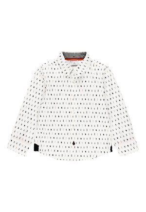 Hvid skjorte med lange ærmer med et sort og gyldent gentaget mønster, der har en knaplukning foran, kontrastende ternet krave og sorte detaljer.
