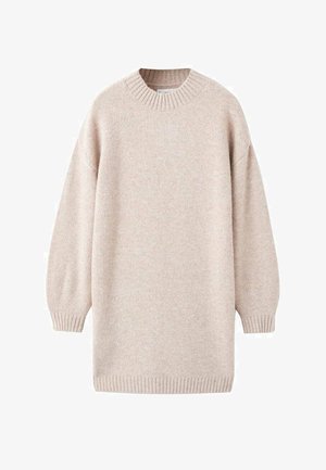 Pull oversized beige clair avec un col et des poignets côtelés, fabriqué en matériau doux et texturé, affichant un design simple et minimaliste.