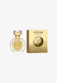 Guess Bella Vita-parfyme har en klar, rund glassflaske med et gull-oksydert lokk og et blomsteremblem, ledsaget av en gull-eske merket med produktdetaljer.