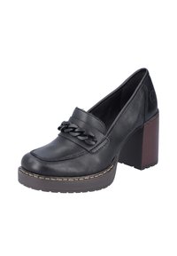 Mocassins à talons en cuir noir avec un détail de chaîne tissée, bout arrondi et talon carré avec une texture semblable à du bois.