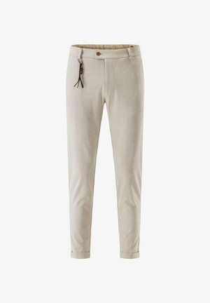 Beige slim-fit trousers with rolled cuffs, button closure, belt loops, and a brown braided leather keychain attached to the right side.