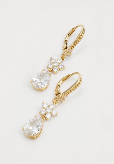 Gold-tone drop earrings featuring a large teardrop crystal and floral cluster of smaller crystals, highlighting clear facets and shiny metal.