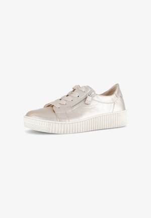 Low-top metallic beige sneaker with thick white ribbed sole, lace-up front, and side zipper on a white background.