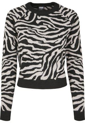 Czarny i biały sweter w paski ze wzorem zebry, dzianina, okrągły dekolt oraz ściągacze przy rękawach i u dołu. Krótkie dopasowanie.