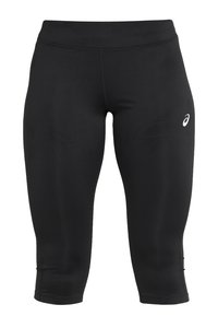 Czarne legginsy capri wykonane z elastycznego, odprowadzającego wilgoć materiału. Posiadają gładki pas w talii oraz małe białe logo po lewej stronie.