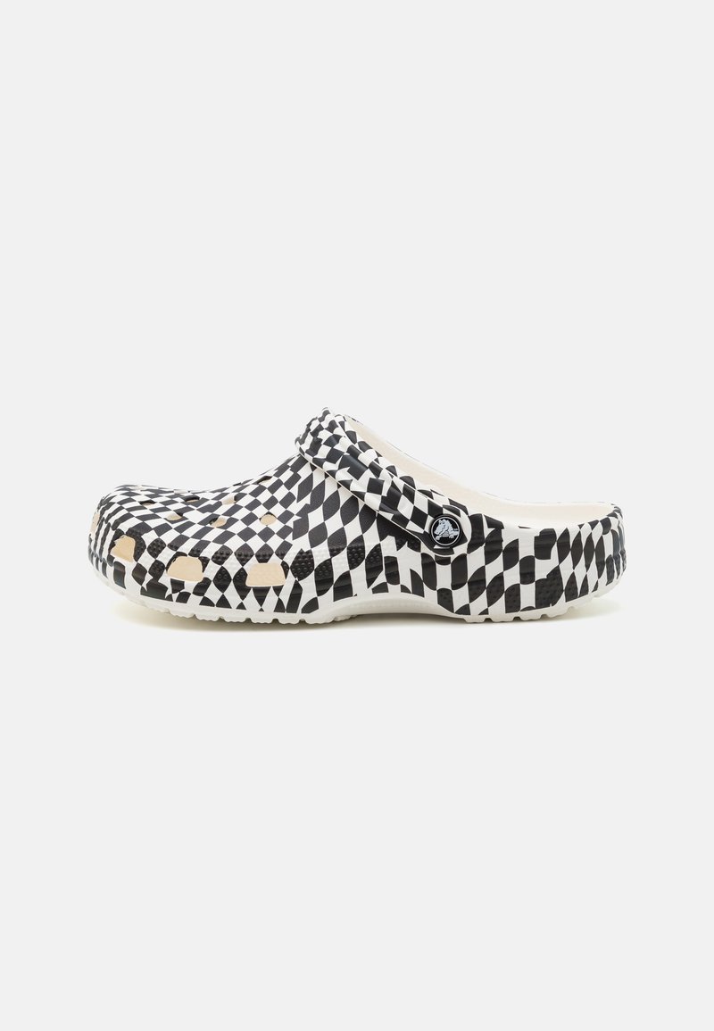 Black and white checkered clogs with a textured design, open heel, ventilation holes, and a strap for secure fit. Made of lightweight material.