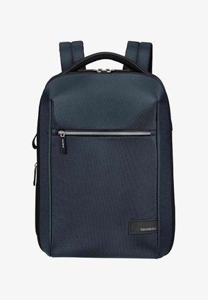 Sac à dos rectangulaire gris foncé avec bretelles rembourrées, poche zippée à l'avant, poignée supérieure et patch logo Samsonite en bas à droite.