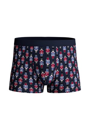 Boxershorts in marineblauw met een herhaald notenkrakerpatroon in rood, wit en blauw. Zachte stof met een nauwsluitende pasvorm en een elastische tailleband.