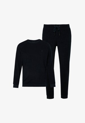 Navyblauwe velours trainingsoutfit met een longsleeve crewneck-top en tapered broek met een verstelbare trekkoord tailleband.