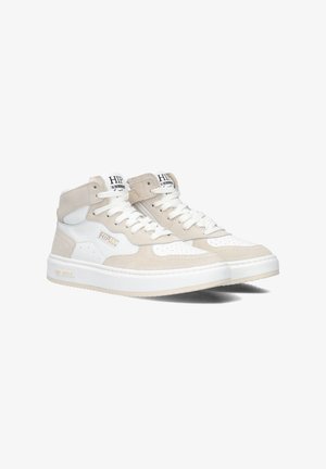 High-top sneakers in beige and white leather and suede, featuring a textured surface, perforated toe box, and white laces.