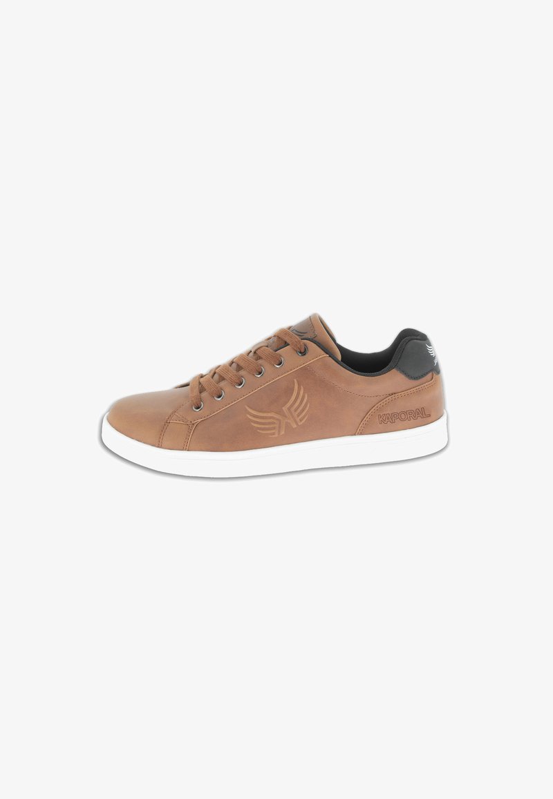 Tan leather sneaker with white rubber sole, round toe, and six eyelets. Features embossed logo and wing design on the side. Black heel accent.