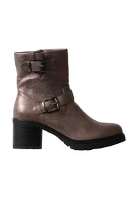 Bottine en cuir marron métallisé montante à la cheville avec deux brides réglables et boucles, bout rond, talon épais noir et fermeture éclair latérale.