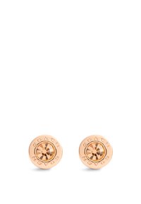 Boucles d'oreilles en or rose avec un cristal transparent central, design circulaire, et inscription "COACH" gravée autour du bord. Fini métallique lisse.