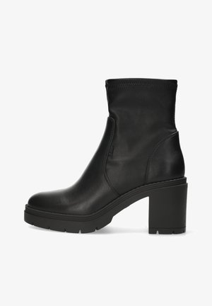Schwarze Ankle Boots aus synthetischem Leder mit einer runden Zehenpartie und einem breiten Absatz. Sie besitzen eine glatte Oberfläche und eine minimale Nahtdetail.