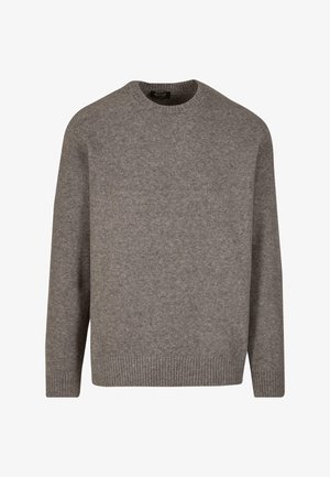 Gaišs pelēks džempers, izgatavots no mīkstas vilnas, ar apaļu kaklu un ribotām piedurknēm. Dizains ir vienkāršs, ar brīvu piegriezumu un bez rakstiem.