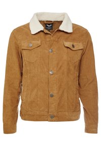 Kurtka sztruksowa w kolorze beżowym z kołnierzem wyściełanym szerpą, wyposażona w dwie kieszenie na piersi, srebrne zatrzaski i teksturowane wykończenie.