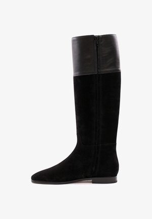 Schwarze kniehohe Stiefel mit einem unteren Teil aus Wildleder und einem glatten Lederoberteil. Sie verfügen über einen seitlichen Reißverschluss und einen niedrigen, abgerundeten Absatz.