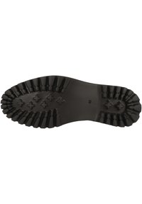 Semelle en caoutchouc noir avec un motif de sculpture texturé. Présente des rainures profondes et plusieurs sections surélevées pour une meilleure adhérence et traction. Taille 43.