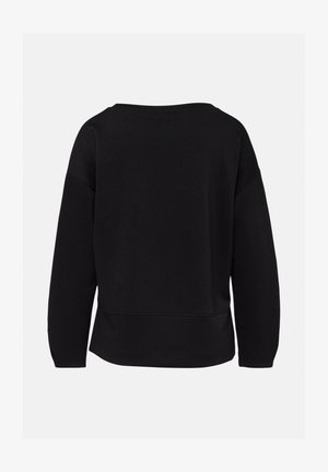 Czarna bluza z długim rękawem o luźnym kroju, z dekoltem typu łódka oraz widocznym szwem na plecach i na dolnym brzegu.