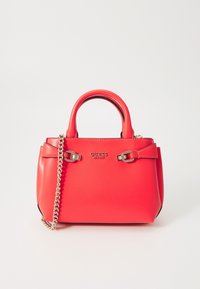 Red Guess handbag with double top handles, decorative gold chain strap, and gold hardware detailing on front.