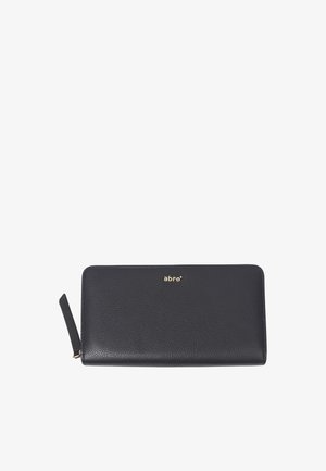 Black leather wallet with a textured surface, gold logo accent, and a zipper closure. Rectangular shape with a side tab for easy opening.