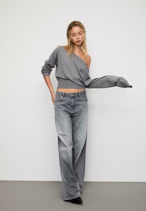 - Sweter