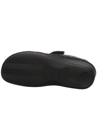 Black rubber sole with textured grip, reinforced edges, and low profile. Features a smooth upper surface with no visible hardware or accents.