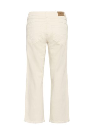 Jean droit couleur crème vu de dos avec deux poches cousues et une étiquette de marque en cuir marron sur la ceinture.