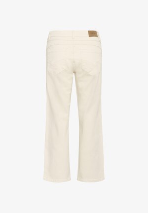 Jean droit couleur crème vu de dos avec deux poches cousues et une étiquette de marque en cuir marron sur la ceinture.