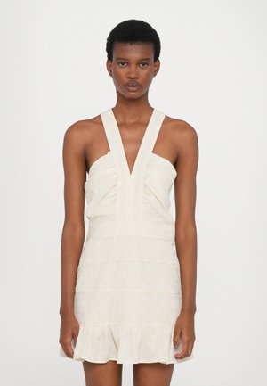 Kleid in Cremetönen mit tiefem V-Ausschnitt, breiten Trägern, gerafftem Oberteil und mehrlagigem Volantsaum. Hergestellt aus leichtem Stoff mit feiner Textur.