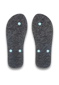 Semelles de chaussures en caoutchouc noir avec un motif texturé et deux accents circulaires bleu clair près du talon, conçues pour l'adhérence et le confort.