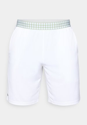 White athletic shorts with a grid-patterned waistband in green and gray. Made from lightweight material, featuring a relaxed fit and smooth texture.