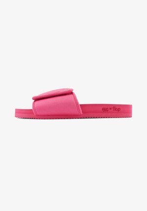 Pink slide sandals with a padded strap, made of soft fabric. Features a flat rubber sole with ridged texture for traction.