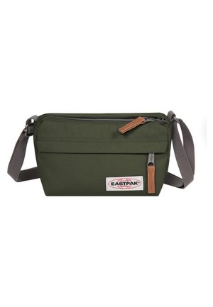 Oliwkowa torba Eastpak na ramię z dwoma zamykanymi na suwak przegrodami i regulowanym szarym paskiem, z leatherowymi uchwytami suwaków.