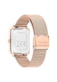 Vierkant roestvrijstalen horloge met een rose gouden mesh band. Heeft een duidelijke achterkant met ingegraveerde merk- en waterdichtheidsdetails.