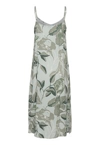 Vestido floral en verde claro con estampado botánico en verde oscuro y gris. Tirantes tipo espagueti y diseño suelto y fluido. Textura de tela suave.