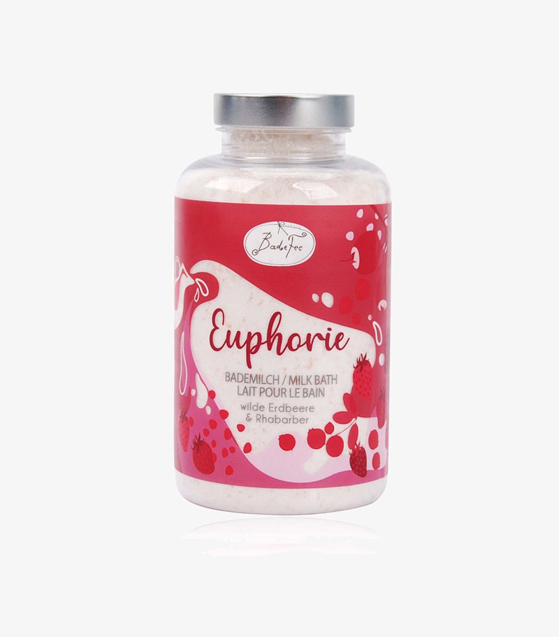 Bottle of Euphorie milk bath powder with wild strawberry and rhubarb scent, featuring red and pink label design and silver cap.
