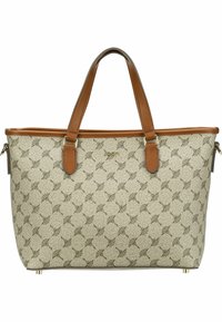 Beige laukku, jossa on kuvioitu pinta, jossa on pyöreitä muotoja, ruskeat nahkahandles, ja metalliset yksityiskohdat. Rakenteellinen muotoilu neljällä jalalla.