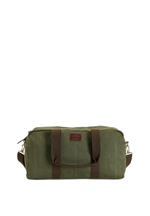 Bolsa de lona verde rectangular tipo duffel con asas marrones y correa para el hombro, cierre con cremallera y un pequeño parche de cuero frontal.