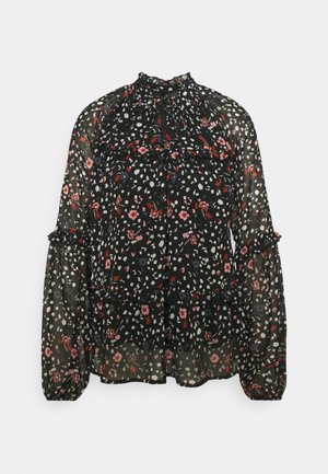 Schwarze, halbtransparente Bluse mit hohem Kragen, langen Ärmeln, Rüschendetails und einem mehrfarbigen Blumen- und abstrakten Muster.