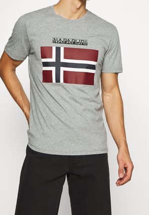 Gray cotton t-shirt featuring a Norwegian flag graphic in red and white, with the brand "NAPAPIJRI" printed above the design. Short sleeves.
